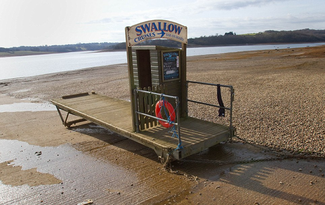Dry as a bone: A stranded boat jetty at Bewl Water reservoir in Kent, February 2012. dailymail.co.uk