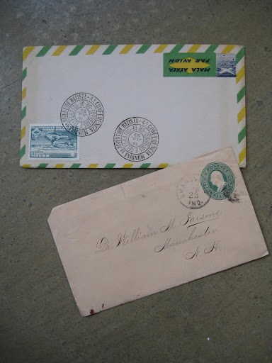 i love the airmail stripes seen here in green and yellow ( kind of unexpected) and on the second envelope we thought the embossed stamp (which is part of the actual envelope and not adhered separately) is pretty darn cool.
