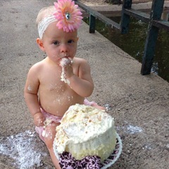 1 year old eating cake