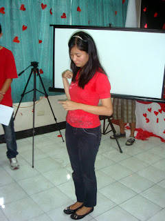 Andrea Celine Limcuando signs the Opening Prayer