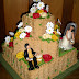Nº105: Fantasía country con novios personalizados, rosas de crema y margaritas de azúcar.