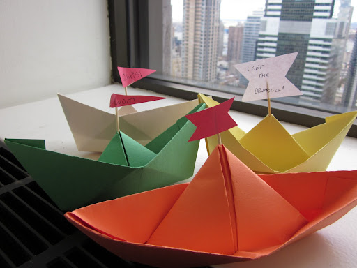In honor of the mighty Mayflower, we crafted paper boat placecards for the Thanksgiving table.