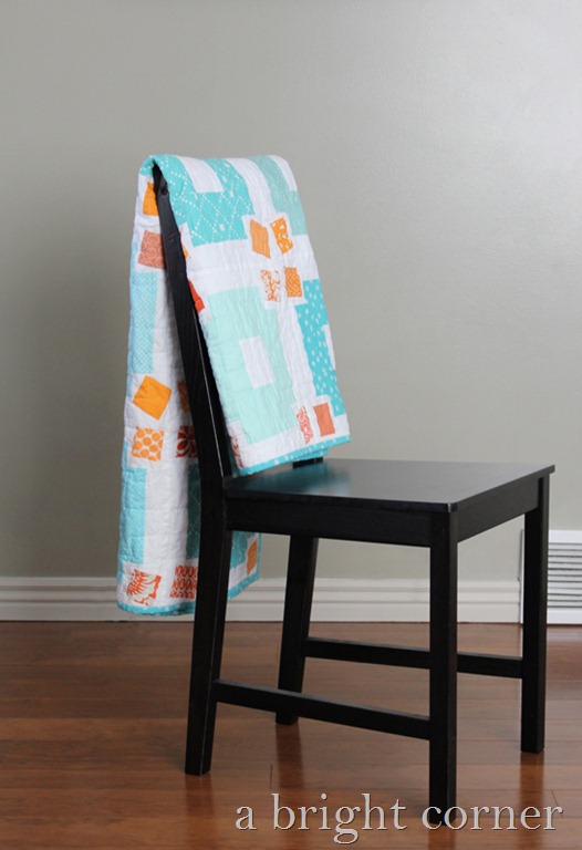 [jumble%2520quilt%2520on%2520chair%2520smaller%255B3%255D.jpg]