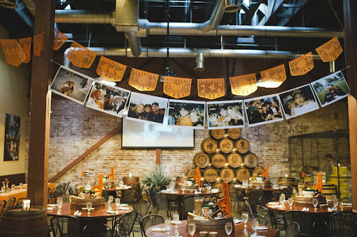 Along with papel picado flags hanging overhead, a banner of photos of the couple at the ballpark during their 11 years of dating was hung. More photos, including ones with the guests, were shown during a slideshow. Along with papel picado flags hanging overhead, a banner of photos of the couple at the ballpark during their 11 years of dating was hung. More photos, including ones with the guests, were shown during a slideshow.