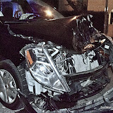Collision at S & 11th
Two lives intersected as a man driving a blue truck southbound on 11th ran a stop sign and collided with a woman driving a black sedan westbound on S St in midtown this evening.
A neighborhood resident said he saw the blue van, tipped on it's side, sliding on the road through his front door.
The front of the sedan sustained major damage. A police officer at the scene said her airbag deployed and she was ok.
The truck driver was transported to the hospital with unspecified minor injuries.
No pedestrians were involved. News_120719_DowntownCollision_KG