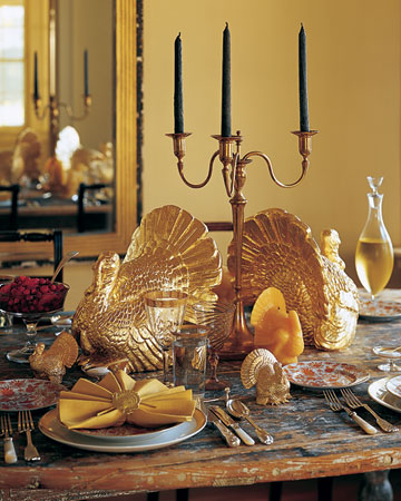 I love the gold turkeys and the long gorgeous candle sticks used on this table top. I love the gold turkeys and the long gorgeous candle sticks used on this table top.