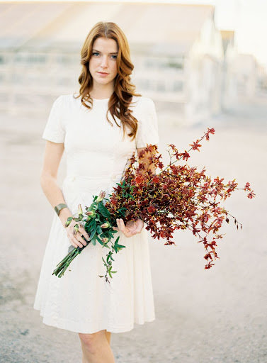Kate loves how this bouquet blends the timeless elegance of form and line with a very passionate deep, dark tone. Kate loves how this bouquet blends the timeless elegance of form and line with a very passionate deep, dark tone.