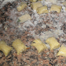 Plantain gnocchi with feta cheese, blood orange and mint