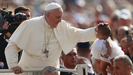 francis_w_baby.jpg Francis w baby