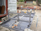 Donated hospital beds being dismantled ready for packing into shipping containers
