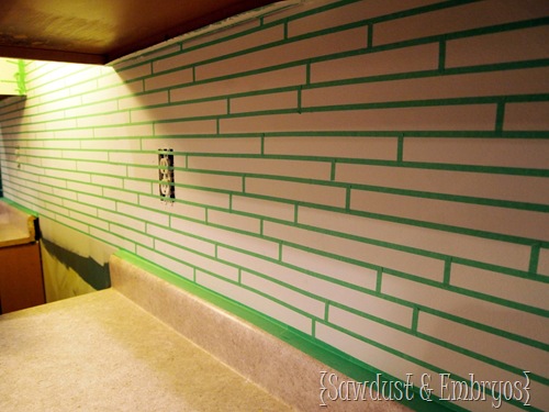 Use tape to make your backsplash look like tile!