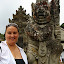 Natalie With A Stone Guardian of the Temple - Bali, Indonesia
