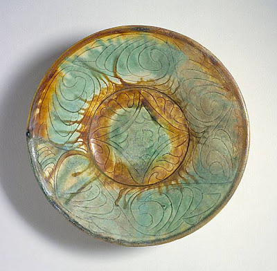 Bowl Iran, Nishapur Bowl, 10th century Ceramic; Vessel, Earthenware, incised, splashes of color in transparent glaze, 2 1/2 x 8 1/2 in. (6.35 x 21.59 cm) The Nasli M. Heeramaneck Collection, gift of Joan Palevsky (M.73.5.148) Art of the Middle East: Islamic Department.