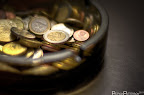 Every evening when I get back I throw the change in my pocket in this ash tray. At last count I was at 92 euro... on Monday, July 18, 2011 at 6:04 PM. Taken with my NIKON D7000 using f/1.4 at 1/30 sec on ISO 400 with my 50 mm f/1.4 lens.