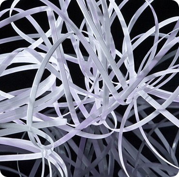 Getingt tangled up and pulling ahead A tangle of shredded paper