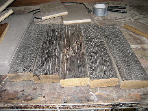Here are some of the boardwalk planks refinished to look like driftwood .  I love that they will get a new life.  The project is a work in progress due to the slow demolition of the boardwalk.