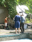 Photographer Thomas Straub shoots the cake with Naomi on hand to make any last-minute adjustments.
