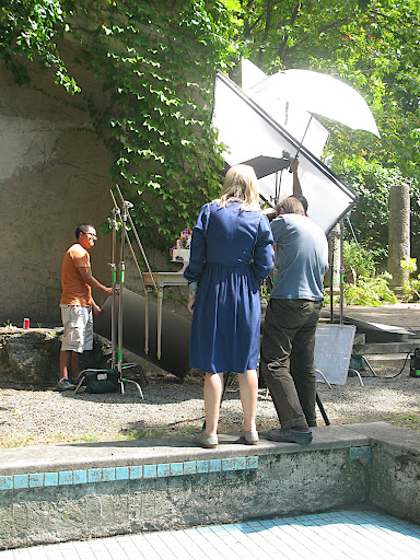 Photographer Thomas Straub shoots the cake with Naomi on hand to make any last-minute adjustments.