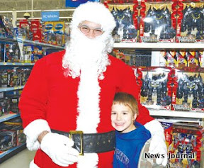 2 col Santa with Josh Jewell.jpg