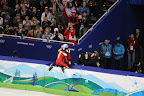 Charles Hamelin hugging his girlfriend after his race