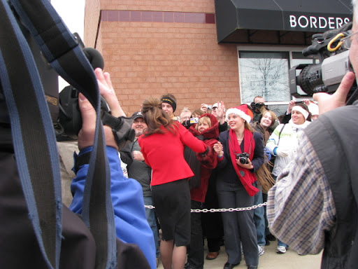 Former Vice Presidential Candidate Sarah Palin shakes peoples' hands outside of Borders.