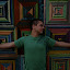 Kyle in front of the wall.
