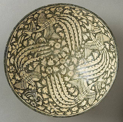Bowl with Four Phoenixes Iran, Sultanabad Bowl with Four Phoenixes, 14th century Ceramic; Vessel, Fritware, green-gray slip, underglaze-painted, 8 1/2 x 4 in. (21.5 x 10.2 cm) The Nasli M. Heeramaneck Collection, gift of Joan Palevsky (M.73.5.215) Art of the Middle East: Islamic Department.