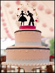 The finished piece atop the Tahitian vanilla cake with mocha buttercream filling. The pink fondant with white stars and navy blue stripes were also based on Eunice's design. The sea foam colored band was paper that was punched using a lace-edged punch.