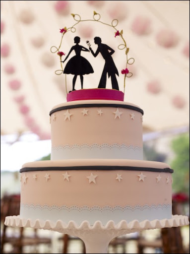 The finished piece atop the Tahitian vanilla cake with mocha buttercream filling. The pink fondant with white stars and navy blue stripes were also based on Eunice's design. The sea foam colored band was paper that was punched using a lace-edged punch.