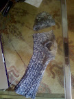 Just cut off the toe and make 2 holes for arms, and voila! You can even keep the toe part as a chapeau...that's hat in French!