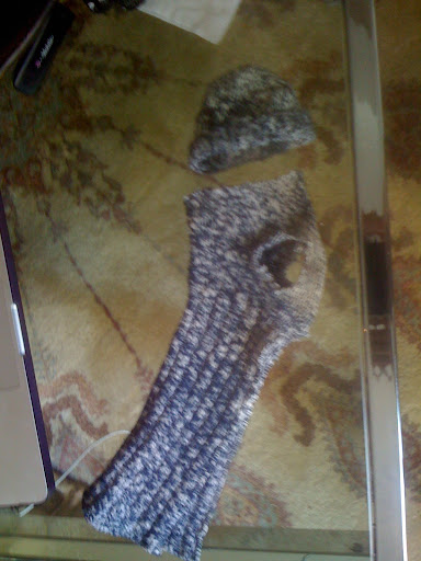 Just cut off the toe and make 2 holes for arms, and voila! You can even keep the toe part as a chapeau...that's hat in French!