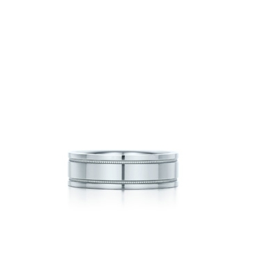 The double millgrain of this Tiffany 6mm platinum wedding band gives this man’s band a royal edge. The double millgrain of this Tiffany 6mm platinum wedding band gives this man’s band a royal edge.