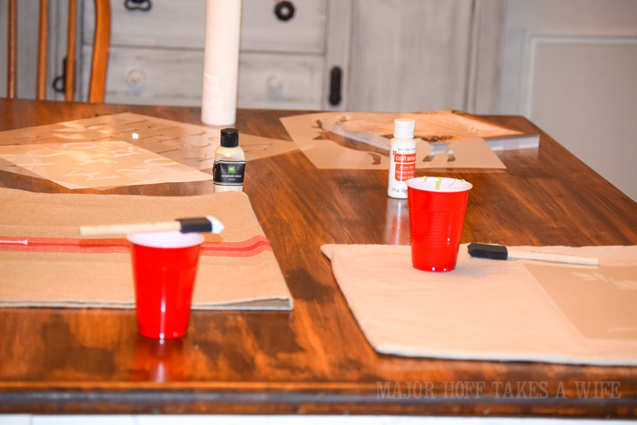 assembly line Christmas craft projects. Looking for a way to bring Creativity into your Holiday Decor? Use easy to find items like pillow covers or dish towels, along with stencils to decorate your home for the Holidays. Enjoy crafting your own decorations this Christmas! #Christmas #Holidays #crafts #HolidayIdeas Assembly line Christmas craft projects. Looking for a way to bring Creativity into your Holiday Decor? Use easy to find items like pillow covers or dish towels, along with stencils to decorate your home for the Holidays. Enjoy crafting your own decorations this Christmas! #Christmas #Holidays #crafts #HolidayIdeas