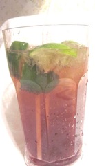 Raspeberry lime rickey drink in tall glass