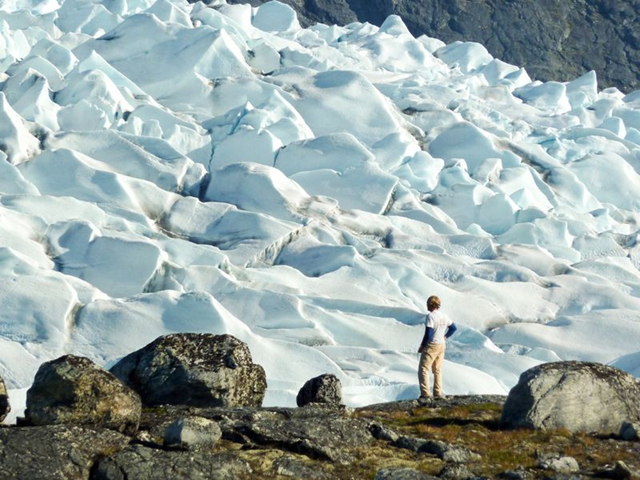 University of Wisconsin geologist Anders Carlson surveys an outlet glacier in southwestern Greenland. Robert Hatfield / Oregon State University