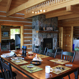 Dining room and fireplace of an Ecolog home