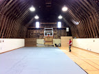 The next step was to cover the lines of the gym floor by laying carpet.