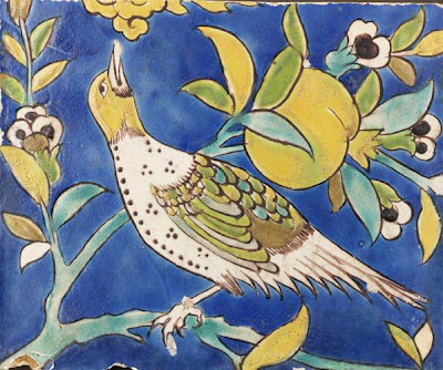Bird on a Pomegranate Branch | Origin:  Iran | Period: 17th century  Safavid period | Details:  Not Available | Type: Tile; stonepaste body painted with glaze | Size: H: 20.6  W: 25.1   D: 3.3  cm | Museum Code: F1999.16 | Photograph and description taken from Freer and the Sackler (Smithsonian) Museums.