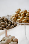 I love Koppers' almond chocolates and the gold wrapped chocolates from Economy Candy. They are delicious and add rich color.