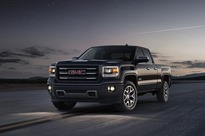 2014 GMC Sierra All Terrain Extended Cab Front Three Quarter in Iridium Metallic - on location