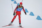 Latvian skiier finishing the race