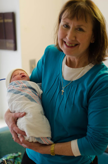 Honey holding baby