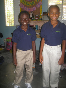 Wilsenci andCarlos are happy about their new clothes.