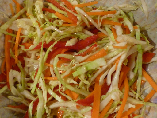 Coleslaw with hot cider vinegar dressing.