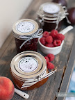 I love the idea of garnishing the jam jar lids with sticker labels and sweet ribbon (photo courtesy of Ellinee.com)