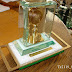 If you are a demanding person looking for a distinguished trophy, we highly suggest that you opt for one of our Jewel Box Series. The JB (jewel box) trophies are composed of one or more gold plated medal mounted on a gold plated plate decorated with a gold plated decoration. All are shaped and engraved to embody your message. All are treasured and preserved in a very accurately cut and beveled glass box; it makes your trophy appear like a rare gem. All are boxed in a luxury velvet or wooden box.