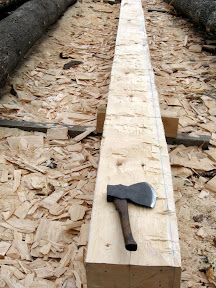 Here is the sill timber with one face left to hew.
