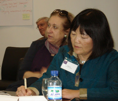 (From front) Diane Yu from New York University, Soukeina Bouraoui from the Centre of Arab Women for Training and Research and Larry Fabian from the NYU Abu Dhabi Institute participate in a discussion on 'Leadership for Public Wellbeing in the Middle East.'