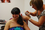 Sophia finishing Jackie's hair.