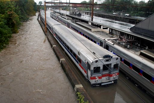 Two Southeastern Pennsylvania Transportation Authority trains sit in water on flooded tracks at Trenton train station Sunday, Aug. 28, 2011, in Trenton, N.J., as rains from Hurricane Irene are causing inland flooding of rivers and streams. AP Photo / Mel Evans